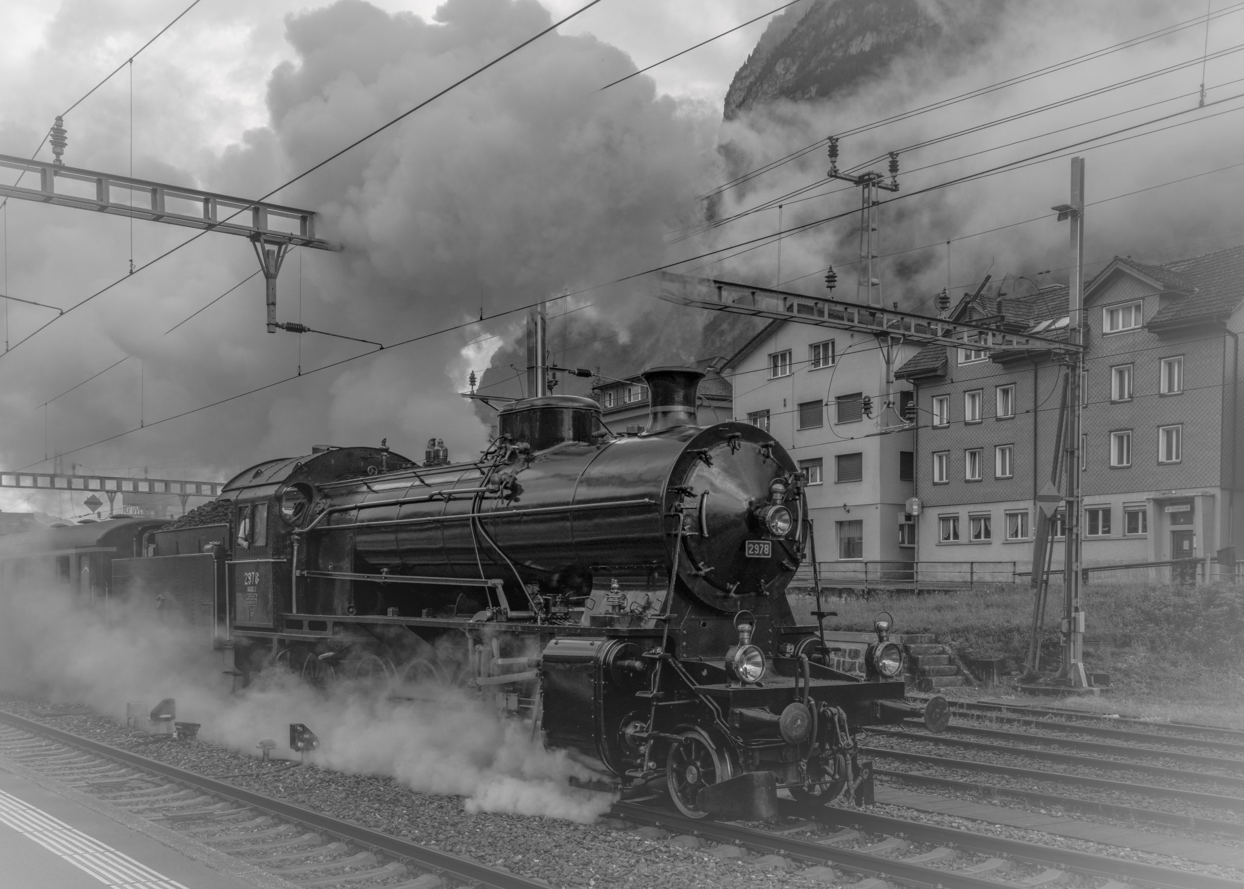 RS_Ausfahrt_Dampf-Extrazug1_mit_C5-6_nach_Goeschenen_SW-2